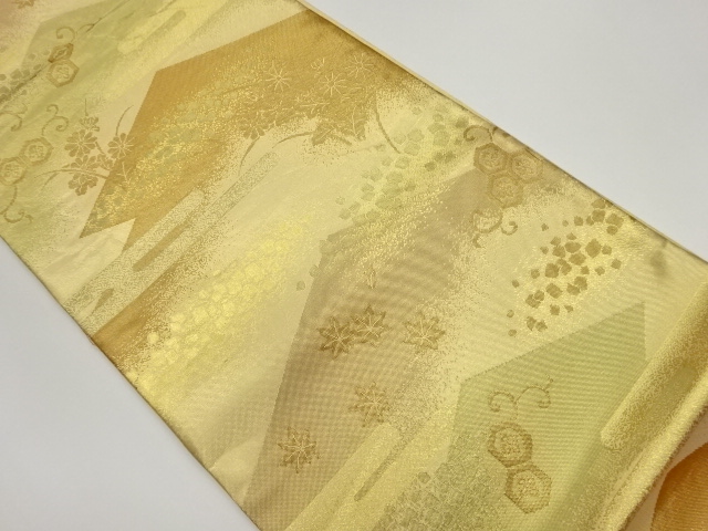 ヱ霞に亀甲花菱・草花模様織出し袋帯